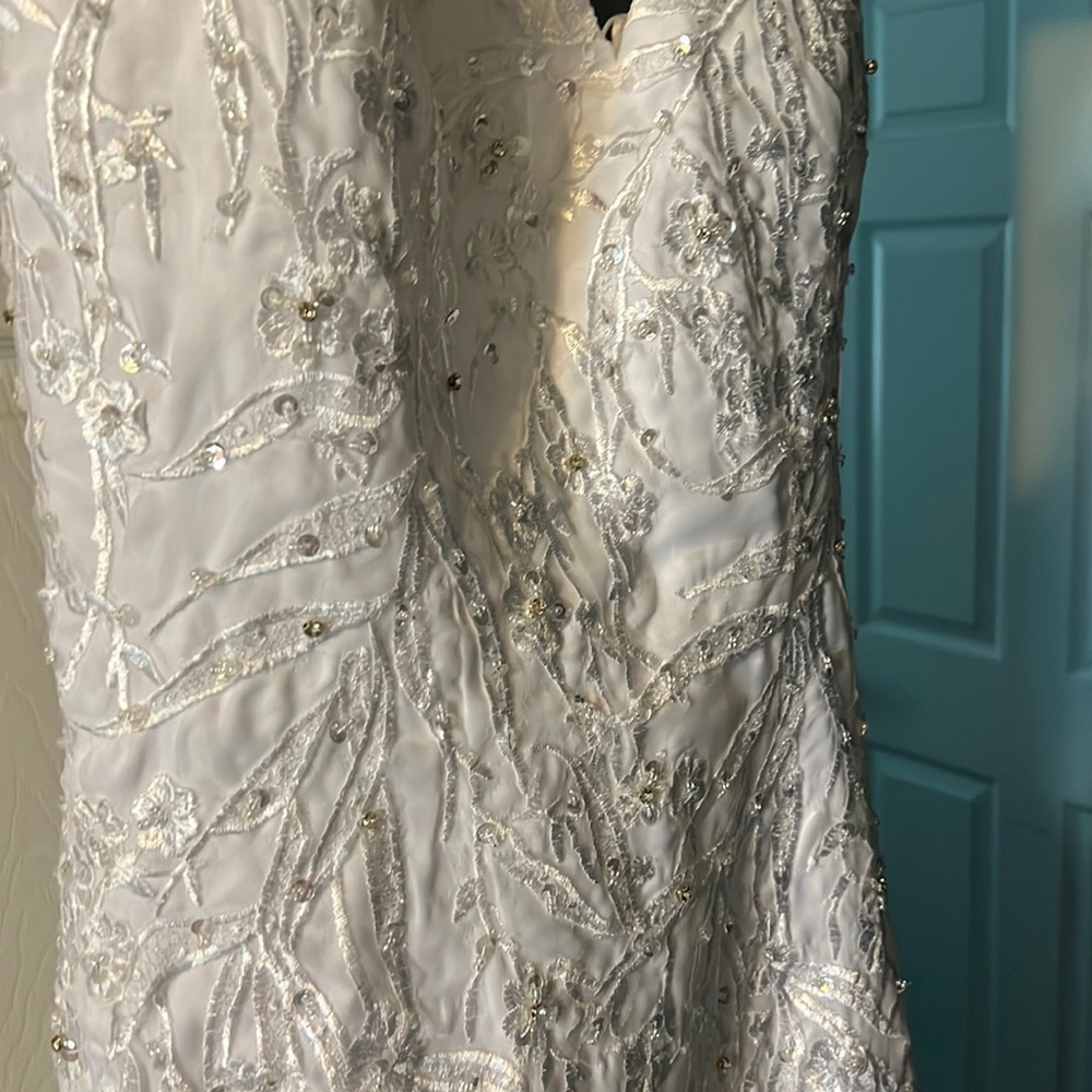 A brand new wedding gown it was to tight for me. So I ordered another one